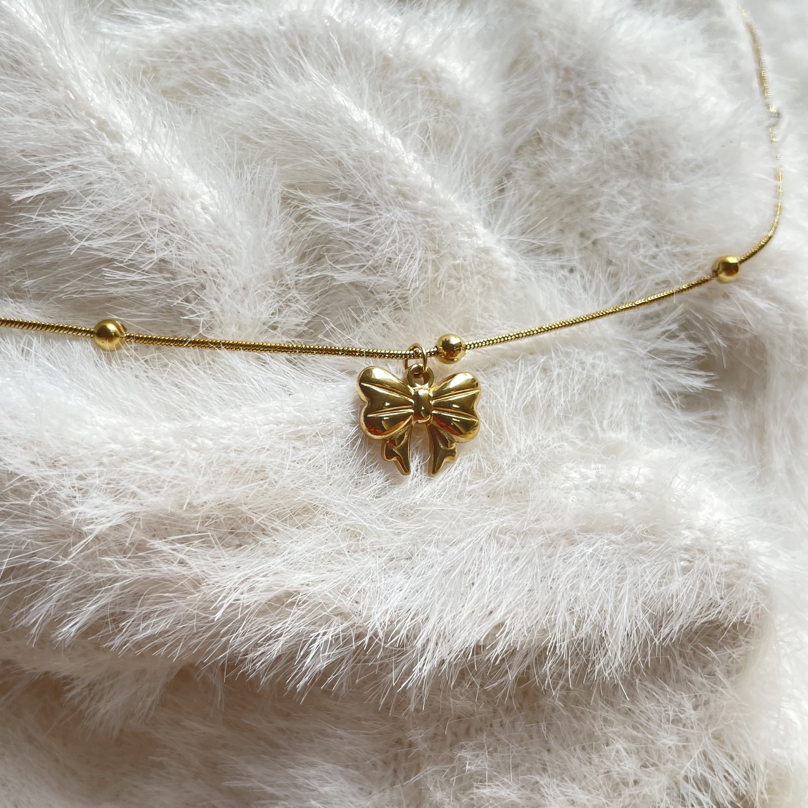 Small Bow Pendent